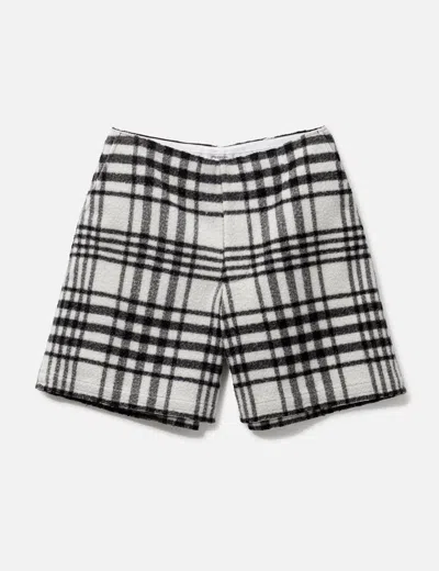 Jw Anderson Wide Leg Plaid Wool Shorts In Black