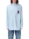 Jw Anderson Light Blue Shirt With Classic Collar And Embroidery Detail On Front And Cuff In Light Blue