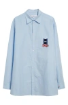 Jw Anderson Light Blue Shirt With Classic Collar And Embroidery Detail On Front And Cuff In Light Blue
