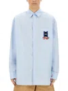 Jw Anderson Light Blue Shirt With Classic Collar And Embroidery Detail On Front And Cuff In Azure