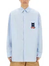 Jw Anderson Men Light Blue Shirt With Classic Collar And Embroidery Detail On Front And Cuff In Line In Blue