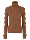 Jw Anderson Cut Out Sleeve Turtleneck Jumper In Brown