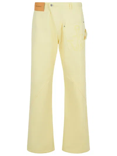 JW ANDERSON JW ANDERSON WORKWEAR' COTTON PANTS WITH YELLOW TWISTED LEG MEN