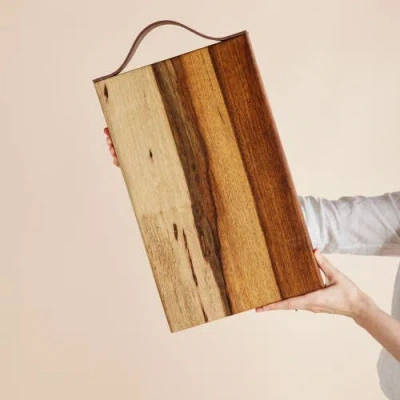 Kanju Interiors Blackwood Cutting Board With Leather Strap In Brown