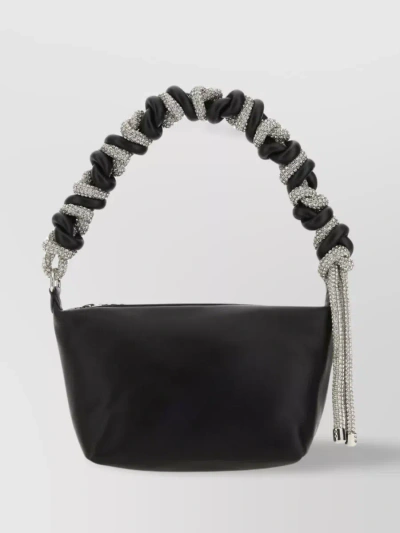 Kara Embellished Handle Structured Leather Clutch In Black