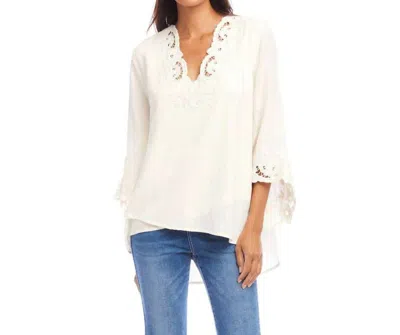 KAREN KANE BRACELET SLEEVE EMBROIDERED ASYMMETRIC TOP IN CREAM