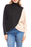 Karen Kane Colorblock Turtleneck Crossover Hem Knit Top In Black