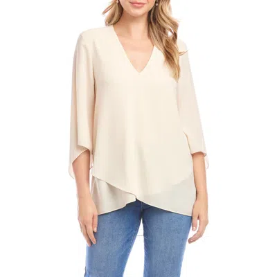 Karen Kane Crossover Hem Asymmetric Top In White