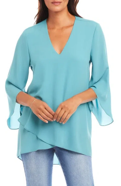 Karen Kane Crossover Hem Asymmetric Top In Aqua
