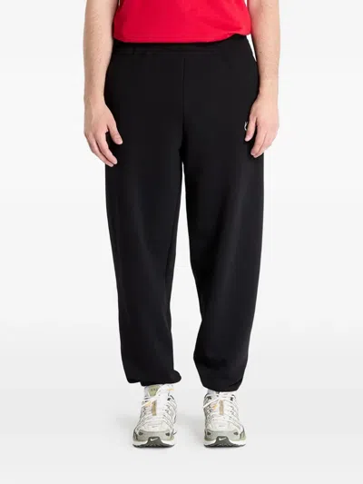 Karl Kani Logo-embroidered Track Pants In Black