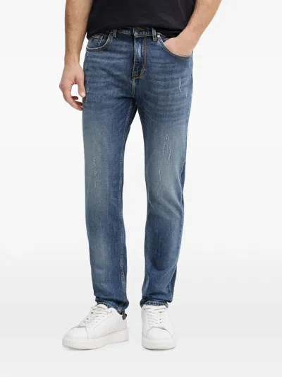 Karl Lagerfeld Distressed Logo-patch Jeans In Blue
