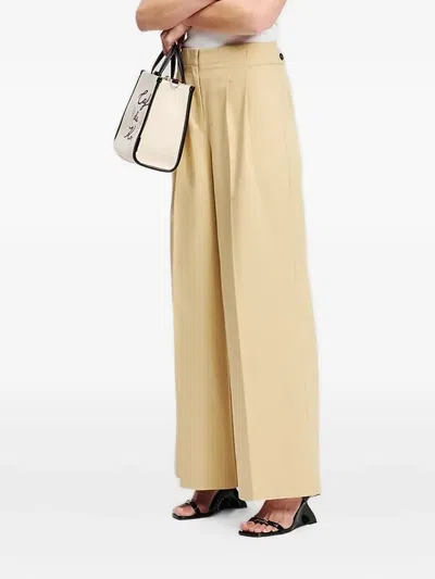 Karl Lagerfeld Pleated-front Adjustable Trousers In Yellow