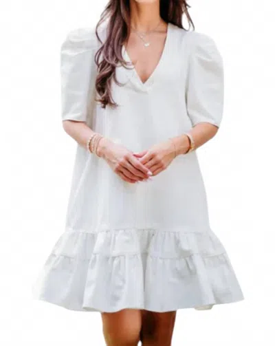 Karlie V-neck Ruffle Bottom Dress In Ivory In White