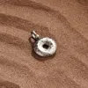 Karma And Luck Strong & Prosperous - Silver Donut Charm In Metallic