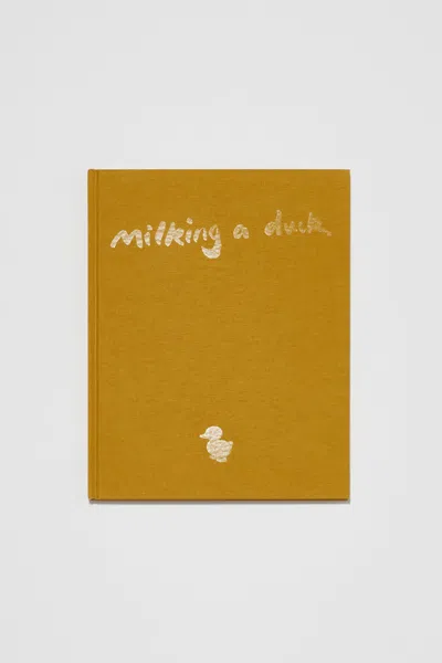 Kate Parfet Milking A Duck In Yellow