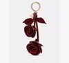 Kate Spade New York Charming Crinkle Patent Leather Key Fob