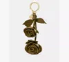 Kate Spade New York Charming Crinkle Patent Leather Key Fob In Green