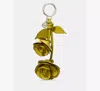 Kate Spade Charmed Rose Bag Charm In Green