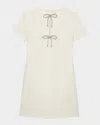 Kate Spade Cutout Rhinestone Bow Mini Dress In Cream.