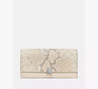 Kate Spade Deco Snake Embossed Large Flap Wallet In Neutral