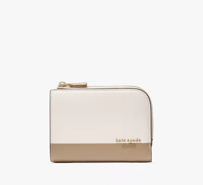 Kate Spade Devin Colorblocked Small Compact Wallet In Neutral
