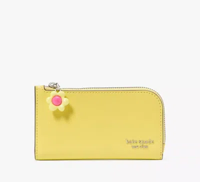 Kate Spade Devin Small Slim Bifold Wallet In Yellow