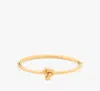 Kate Spade Double Knot Hinged Bangle In Gold