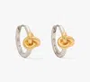 Kate Spade Double Knot Huggies In Silver Gold