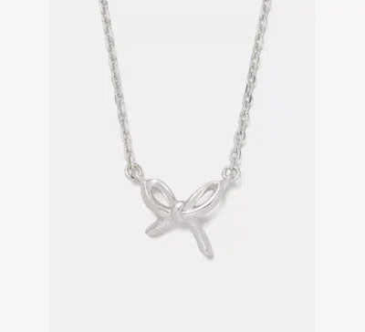 Kate Spade Girlie Pearlie Mini Bow Pendant In Metallic