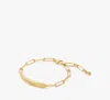 Kate Spade Silver Lining Id Bracelet In Gold