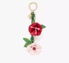Kate Spade In The Garden Flower Leather Keychain In Pastry Pink