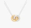 Kate Spade Interlock Pendant In Silver Gold