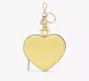 Kate Spade Liv Heart Coin Purse In Yuzu Jam
