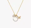 Kate Spade Lucky Charm Statement Pendant In Gold