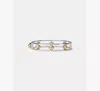 Kate Spade Two-tone Sculpted Spade Cut Out Bangle Bracelet In Metallic