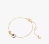 Kate Spade New York Interlocking Two-tone Bezel Stone Chain Bracelet In Clear/two Tone