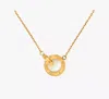 Kate Spade Set In Stone Interlink Pendant In Gold Clear