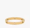 Kate Spade Spot The Spade Studded Hinged Bangle In Gold