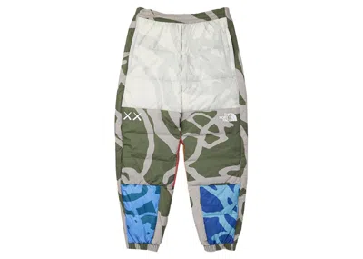 Pre-owned Kaws Men's  X The North Face Retro 1996 Nuptse Pants In Moonlight Ivory Nuptse Print In White