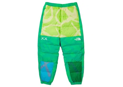 Pre-owned Kaws Men's  X The North Face Retro 1996 Nuptse Pants In Safety Green Nuptse Print