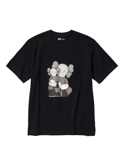 Kaws Ut Graphic T-shirt In Black