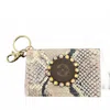 Keep It Gypsy Animal Print Clip Wallet In Brown In Brown