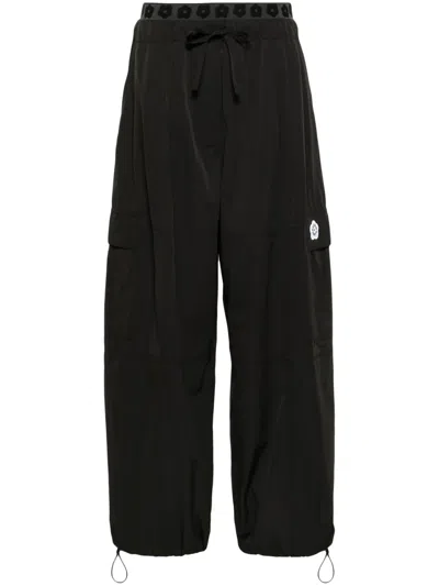 Kenzo 'boke Flower 2.0' Black Pants With Flowers Embellishmed Waist And Logo Patch On The Pocket