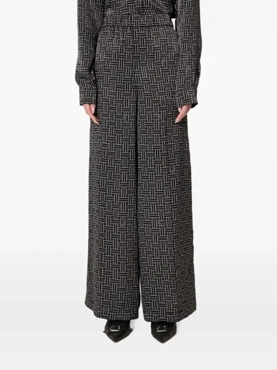 Kenzo Geometric-pattern Trousers In Grey