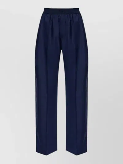Kenzo Logo-embroidered Pleated Wool Trousers In Blue