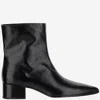 Khaite Andee Leather Ankle Boots In Black
