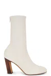 Khaite Apollo 85 Mid Heel Boot In Cream