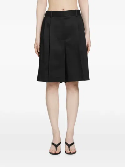 Khaite Auggie Pleated Shorts In Black
