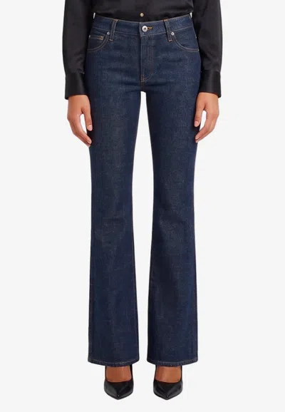 Khaite Benson Washed Denim Flared Jeans In Blue