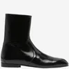 Khaite Glossy Enameled Leather Boot In Black